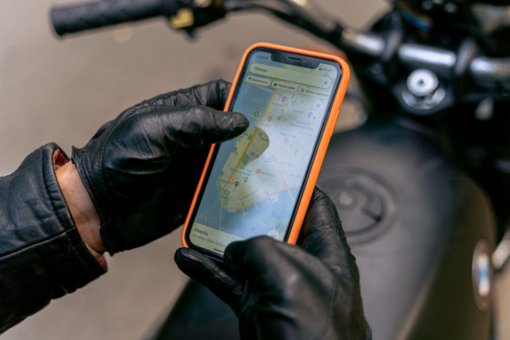 Looking At Map on Phone On Motorcycle