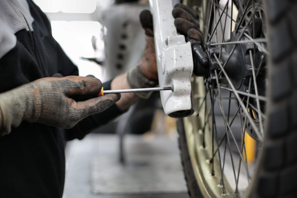 Tightning a Screw On A Motorcycle